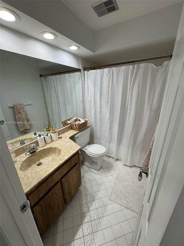 bathroom featuring recessed lighting, visible vents, toilet, vanity, and tile patterned flooring