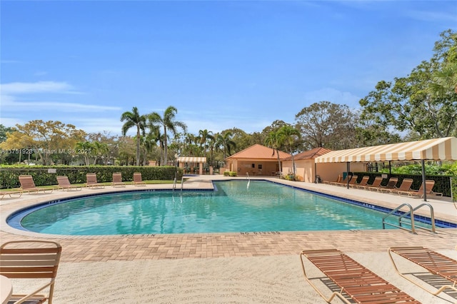 pool with a patio