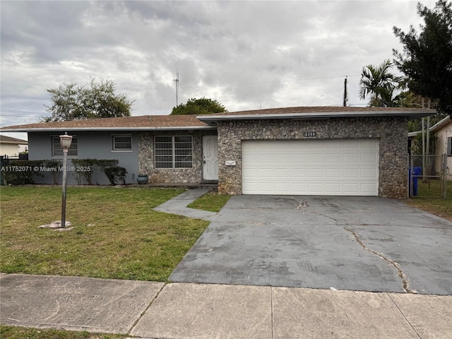 5360 Fletcher St, Hollywood, FL 33021 - ranch-style home with fence, a front yard, stucco siding, driveway, and an attached garage