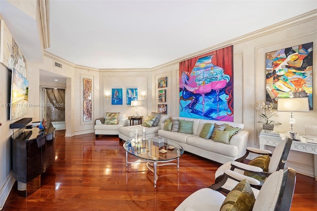 living area featuring visible vents, ornamental molding, and dark wood-type flooring