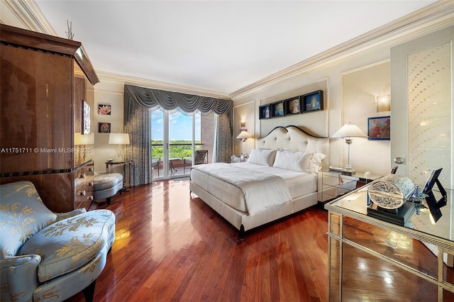 bedroom with access to exterior, ornamental molding, and dark wood-type flooring