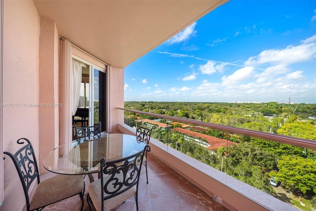 balcony with a forest view