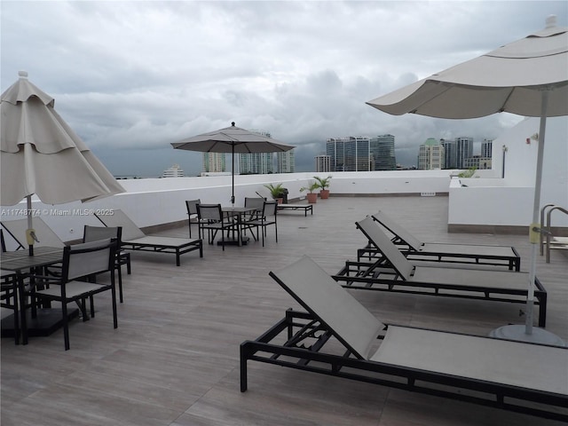 view of patio / terrace featuring a city view