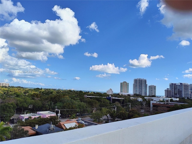 balcony featuring a city view