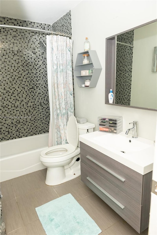 full bathroom with vanity, shower / bathtub combination with curtain, toilet, and tile patterned floors