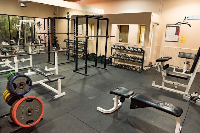 gym featuring wainscoting