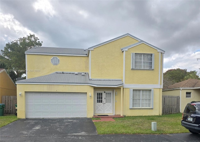 view of front of home with a garage, fence, aphalt driveway, and stucco siding