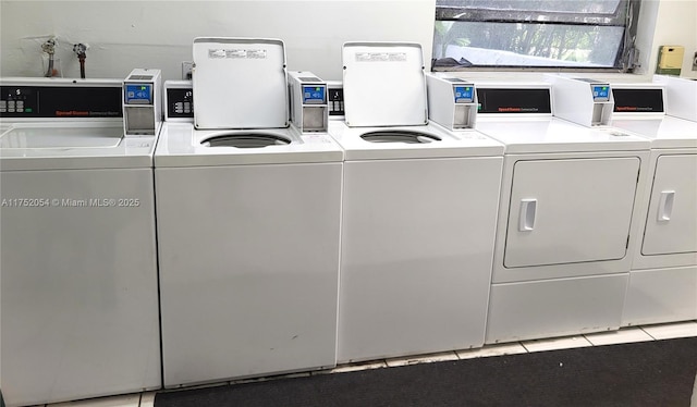 shared laundry area with washing machine and dryer