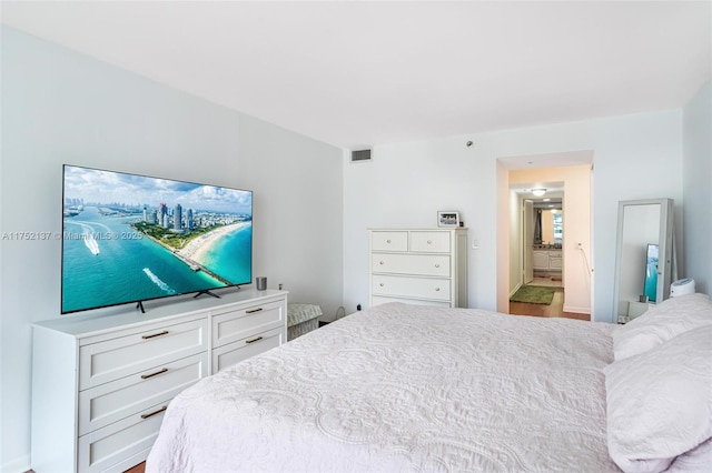 bedroom with visible vents