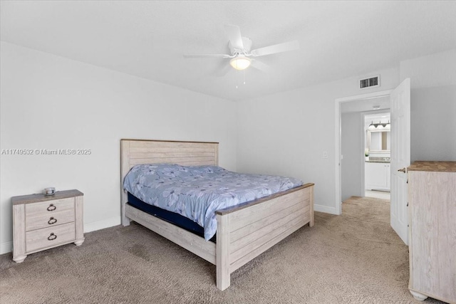 bedroom with light carpet, baseboards, and visible vents