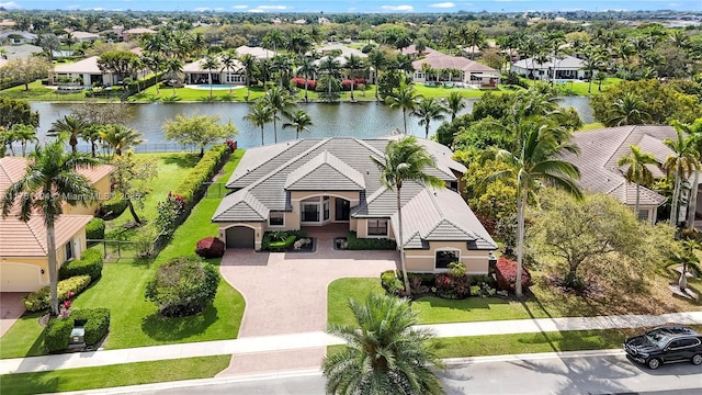 bird's eye view with a water view and a residential view