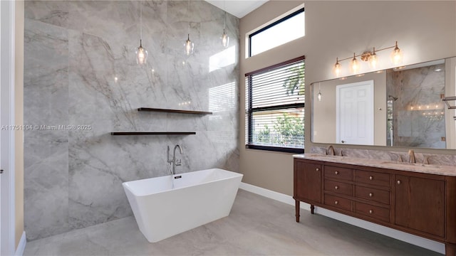 full bath featuring a shower, a freestanding tub, a sink, and double vanity