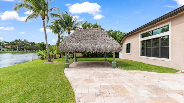 exterior space featuring a water view and a gazebo