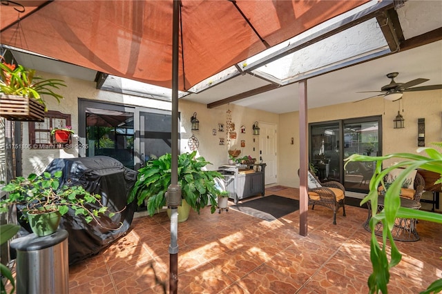 view of patio / terrace featuring ceiling fan and area for grilling
