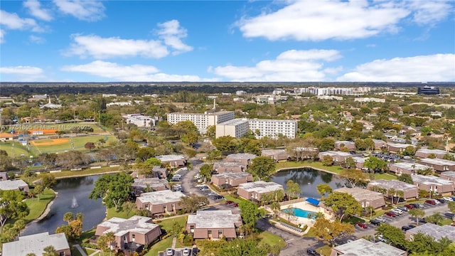 drone / aerial view with a water view