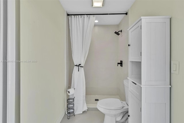 full bath with a shower stall and toilet