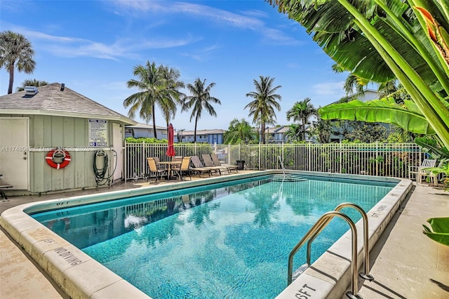 pool featuring fence