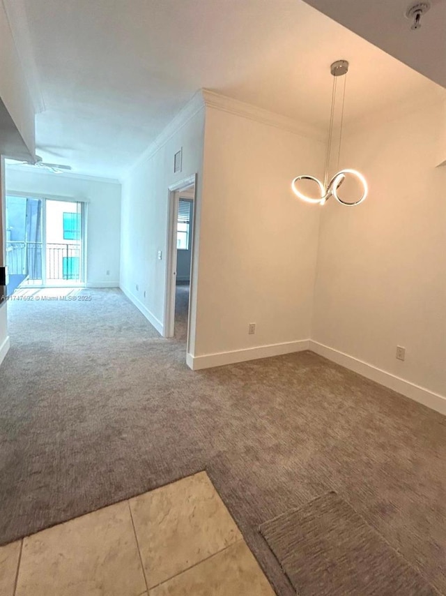 carpeted empty room featuring a notable chandelier, ornamental molding, visible vents, and baseboards