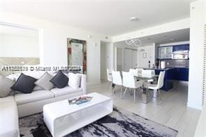 living area featuring wood finished floors