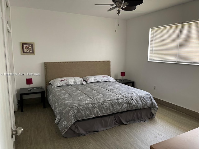 16900 NE 14th Ave Unit 209, Miami, FL 33162 - bedroom with wood finished floors, baseboards, and ceiling fan