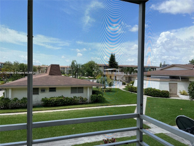 16900 NE 14th Ave Unit 209, Miami, FL 33162 - view of home's exterior featuring a lawn