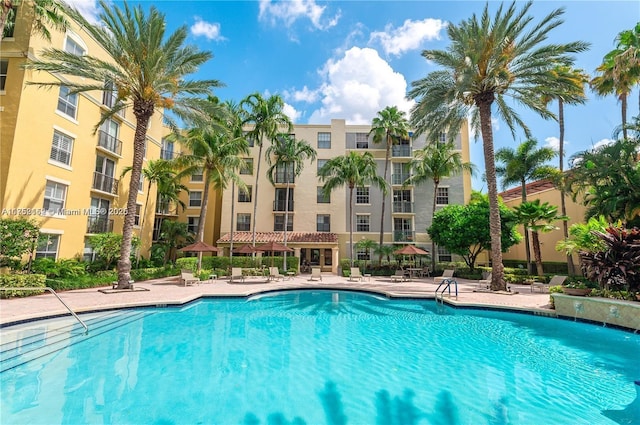 community pool featuring a patio