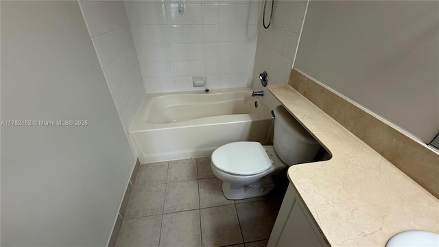 full bathroom with baseboards, toilet, tile patterned floors, tub / shower combination, and vanity