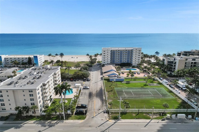 bird's eye view featuring a water view and a city view