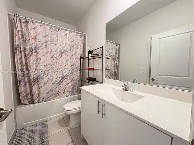 full bathroom featuring toilet, tile patterned flooring, vanity, and shower / tub combo with curtain