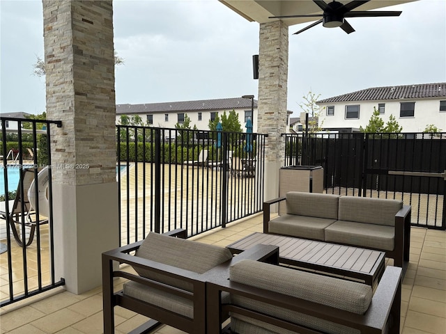 exterior space with ceiling fan and an outdoor living space