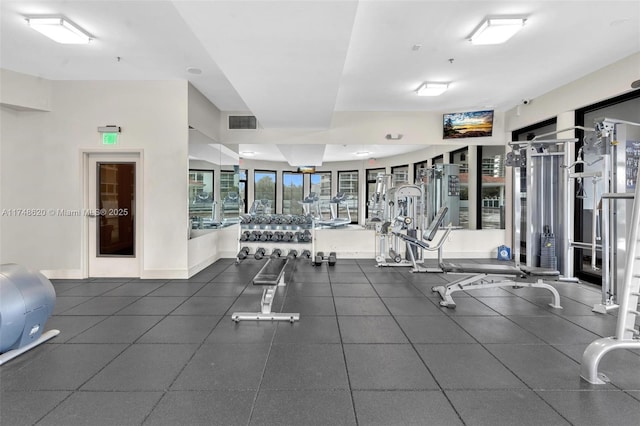 workout area with visible vents and baseboards