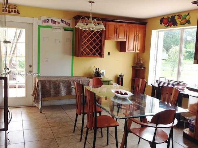 dining space with light tile patterned floors