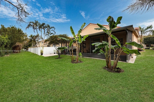 view of yard featuring fence