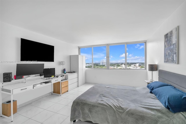 bedroom featuring light tile patterned flooring