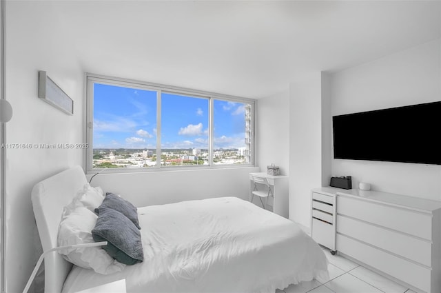 bedroom with light tile patterned flooring