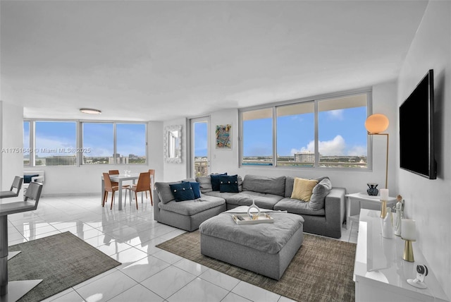 living room featuring light tile patterned floors