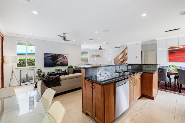 kitchen with open floor plan, brown cabinets, a sink, and dishwasher