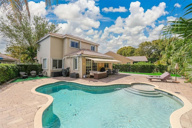 view of swimming pool featuring a fenced in pool, a patio, a jacuzzi, and fence