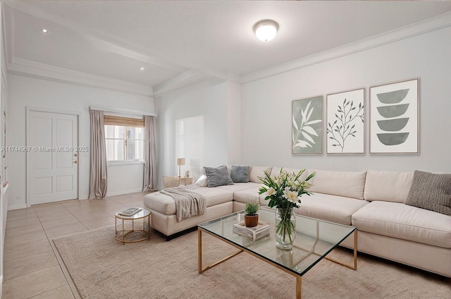 living area with ornamental molding, light tile patterned flooring, and baseboards