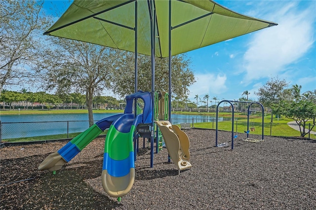 communal playground featuring fence