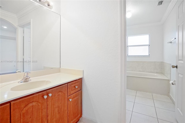 full bath featuring ornamental molding, a bath, tile patterned flooring, and vanity