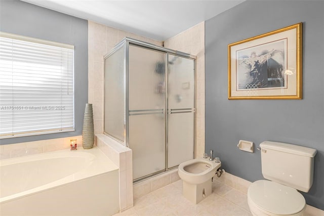 full bathroom with toilet, tile patterned floors, a garden tub, a shower stall, and a bidet