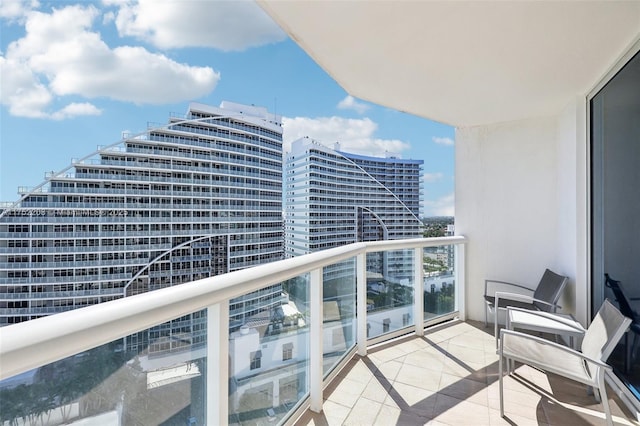 balcony featuring a city view