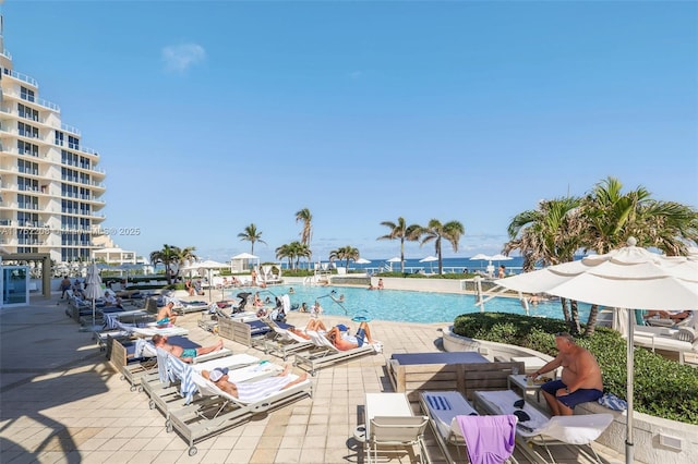 community pool with a patio