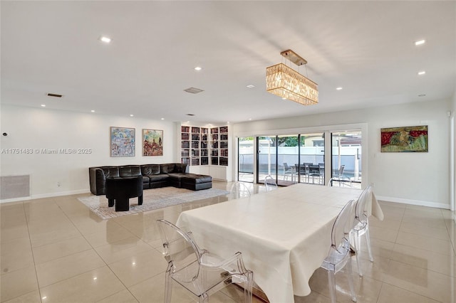 dining room featuring light tile patterned floors, baseboards, visible vents, and recessed lighting