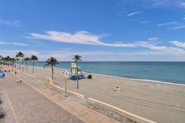 property view of water featuring a beach view