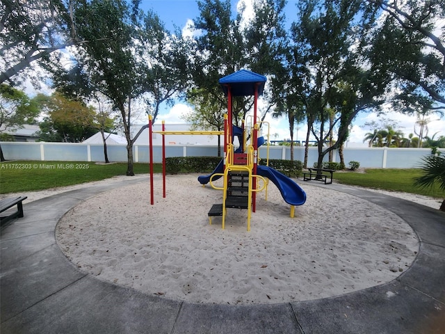 community jungle gym with fence