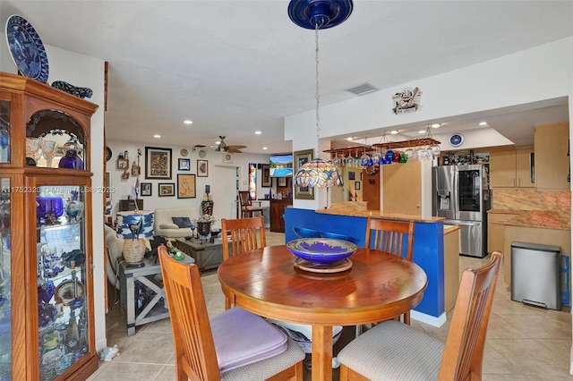 dining space with a ceiling fan, recessed lighting, light tile patterned flooring, and visible vents