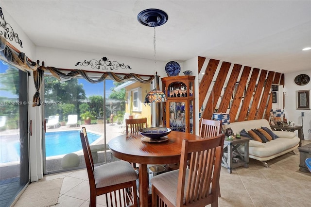 dining room featuring light tile patterned flooring