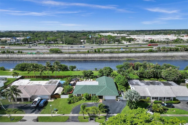 aerial view with a water view and a residential view